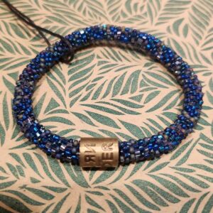 Armband roll on blauw met glazen kralen - Return to Sender