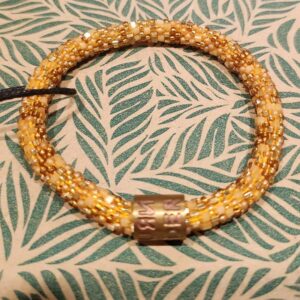 Armband roll on goud met glazen kralen - Return to Sender