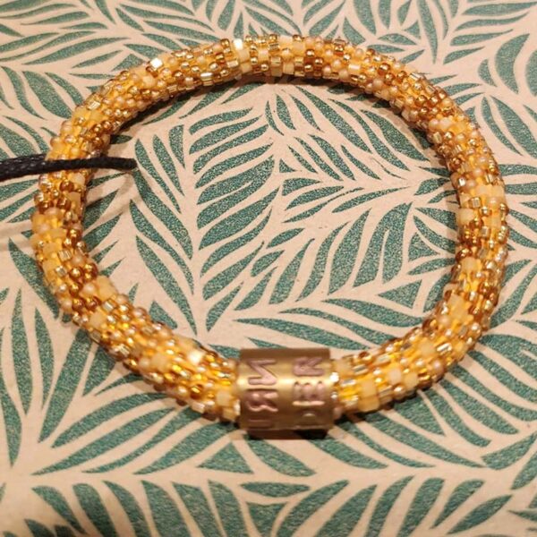 Armband roll on goud met glazen kralen - Return to Sender