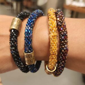 Armband roll on met glazen kralen - Return to Sender