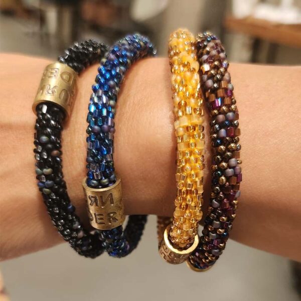 Armband roll on met glazen kralen - Return to Sender